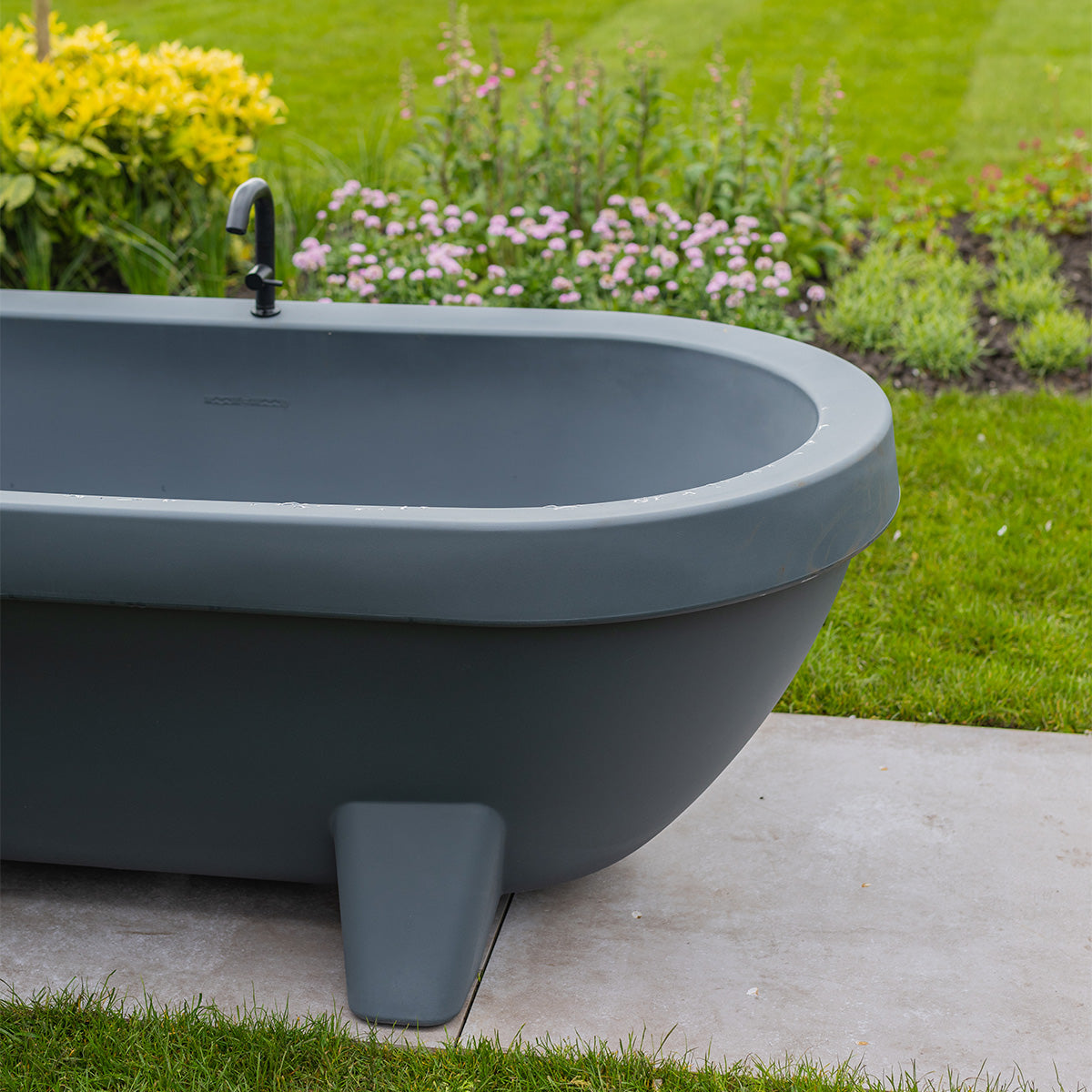 Anthracite Gardentub with Matte Black Gardentub Tap on a garden terrace